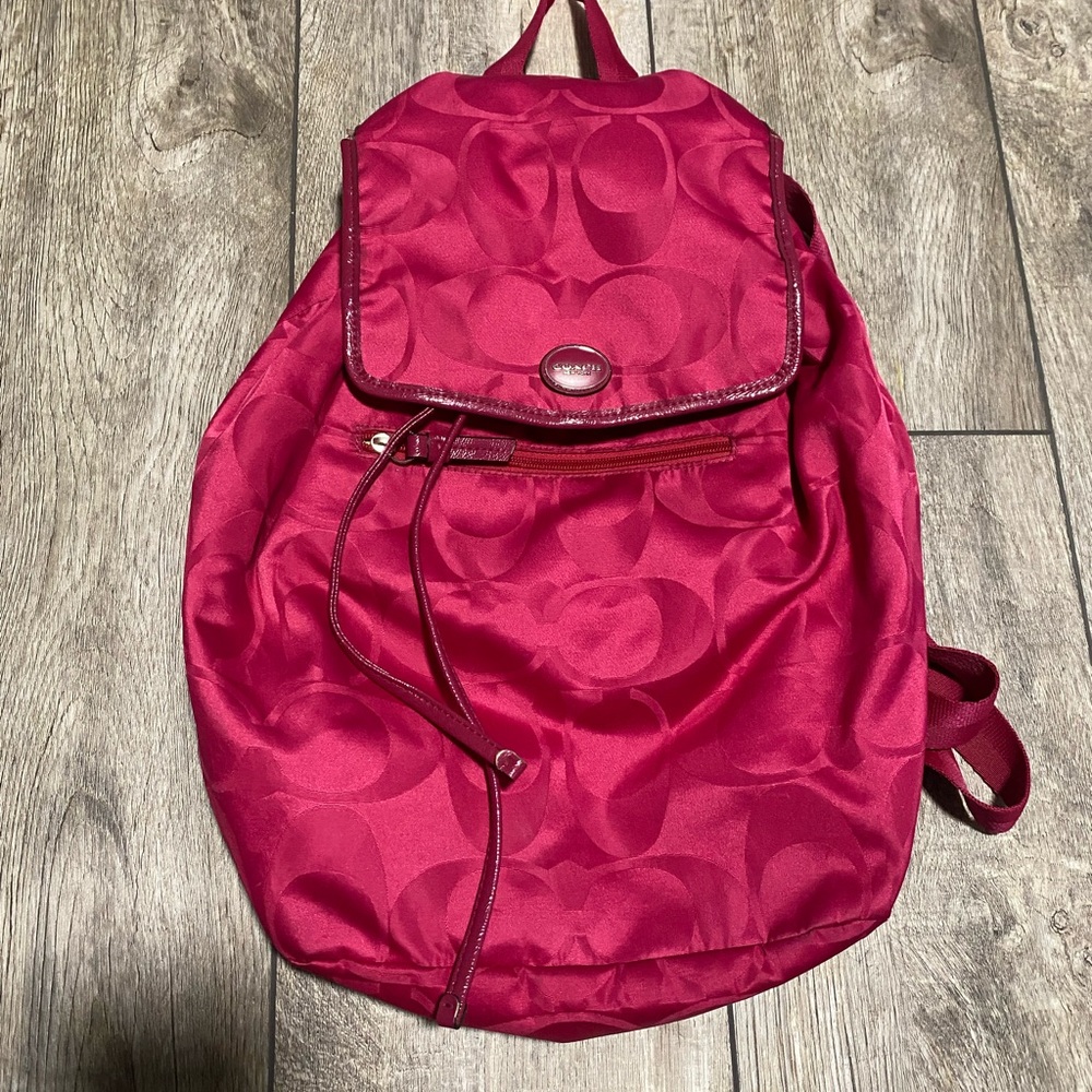 COACH hot pink backpack with C logo
